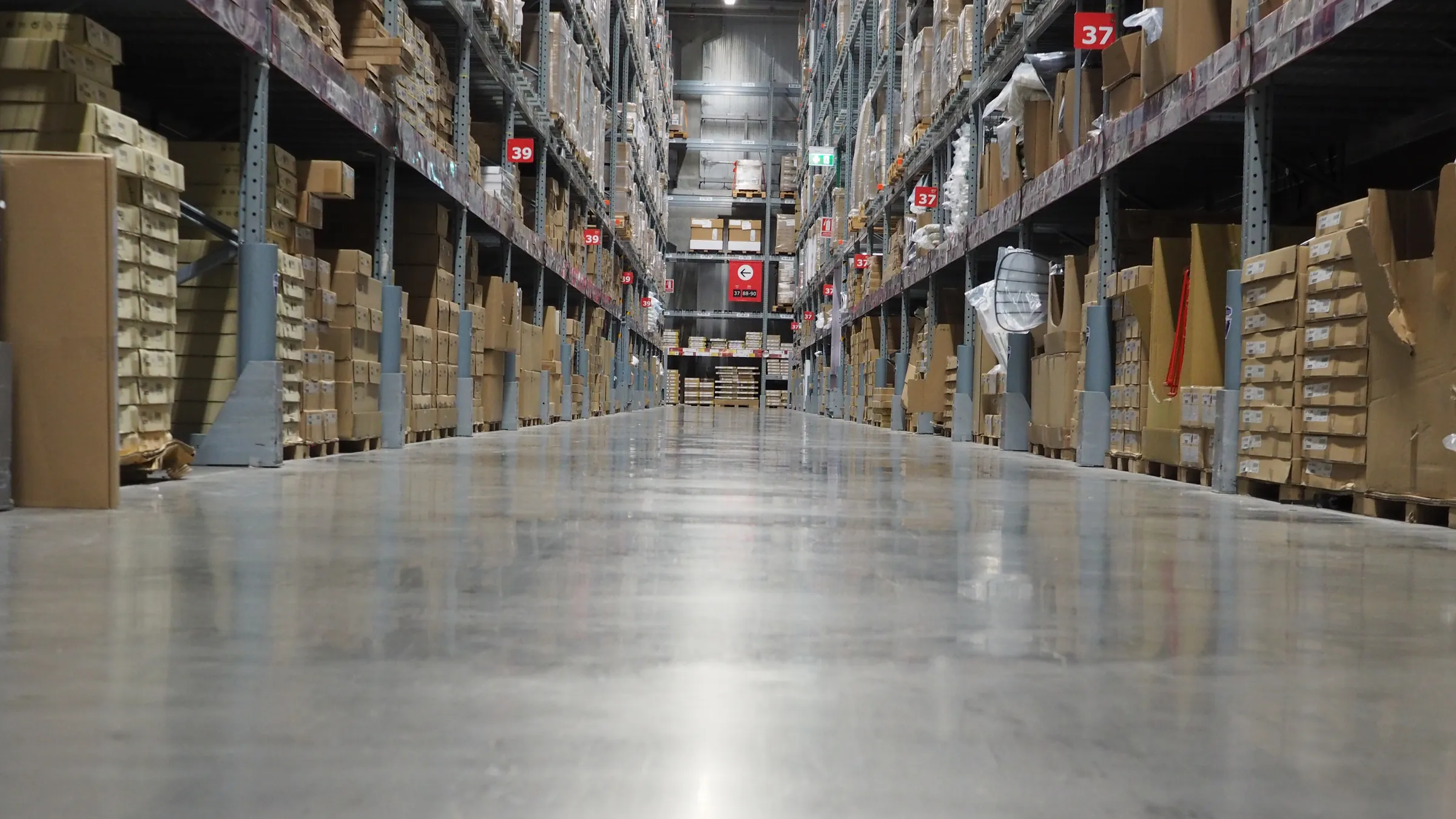 Resin floor coating in a warehousing & logistics facility