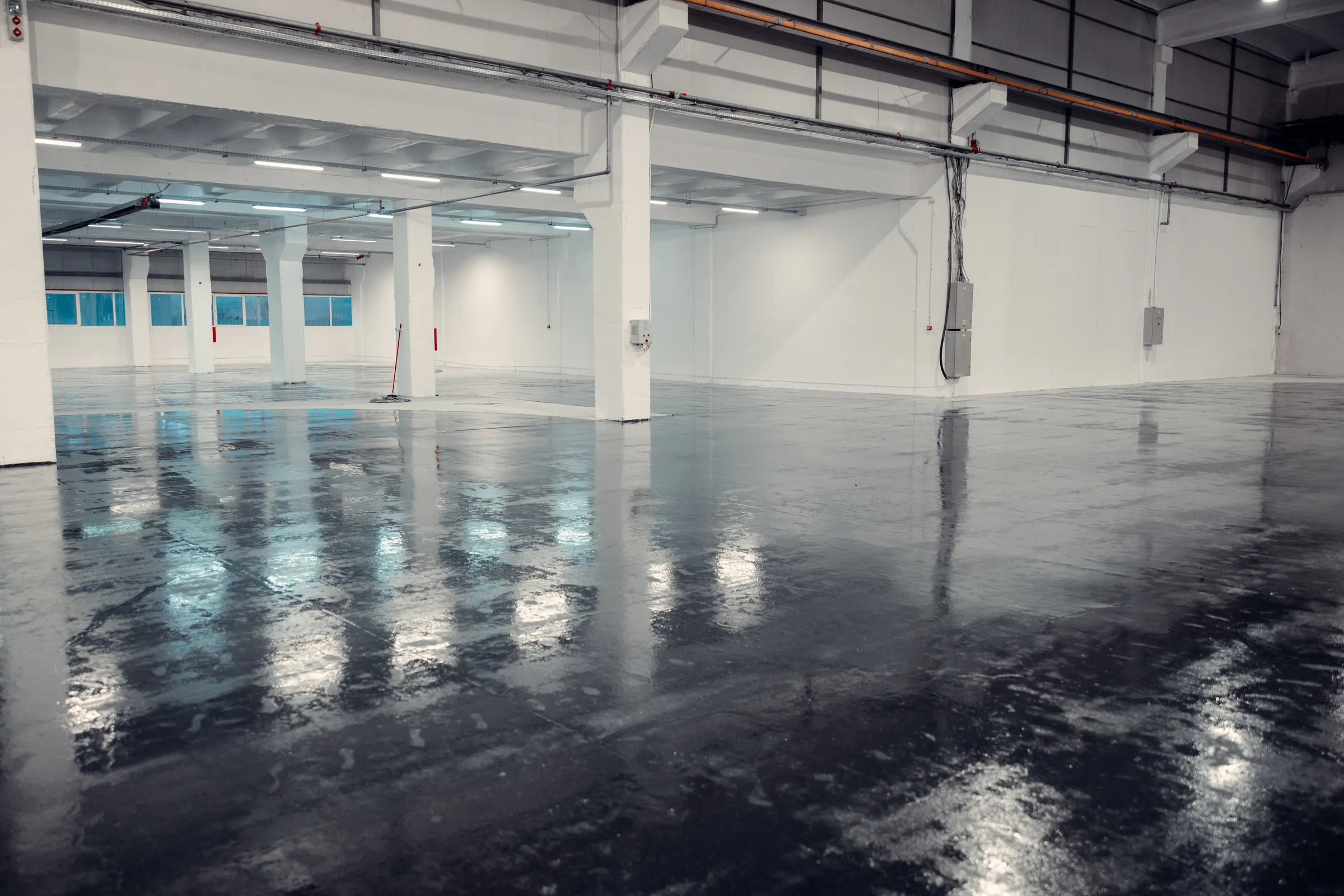 Epoxy coatings & self-levelling epoxy resin floor system on an industrial floor
