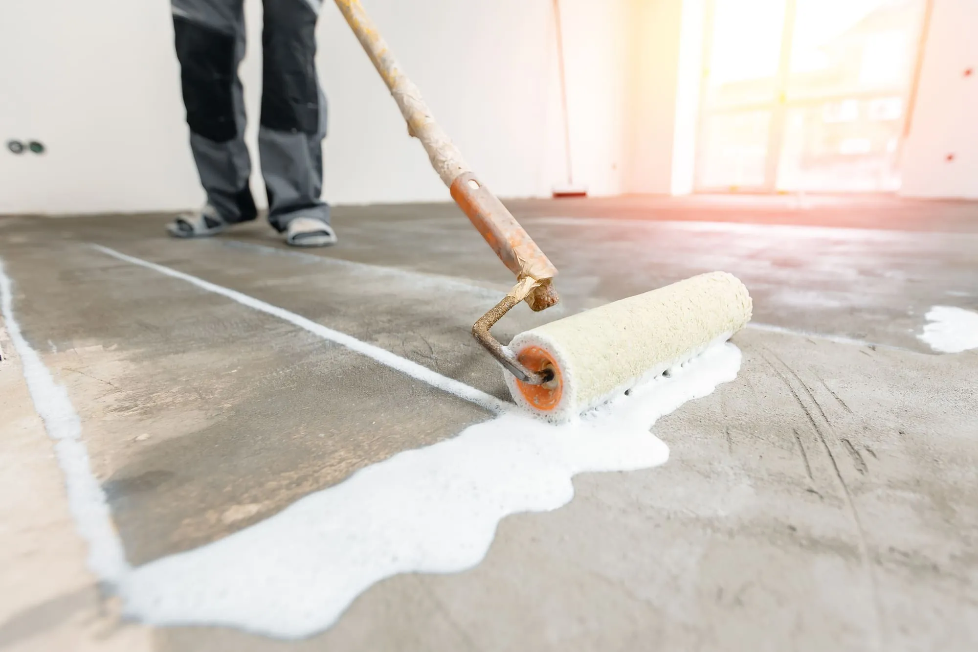 Primers, sealers, DPMs & concrete repair resin floor system on an industrial floor